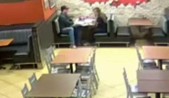 CCTV still of the couple eating at the restaurant (PA)