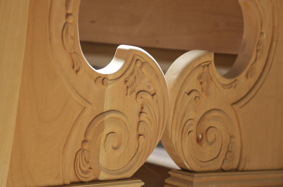 A detail of pews that will be used by Cardinals, Bishops and pilgrims during Pope Francis' Mass on World Youths Day, at Hernan Guardia's carpentry workshop where the Pope's chair is also being built in Los Pozos, Panama, Saturday, Jan. 12, 2019. The Argentine pontiff visit Panama Jan. 23-27. (AP Photo/Arnulfo Franco)