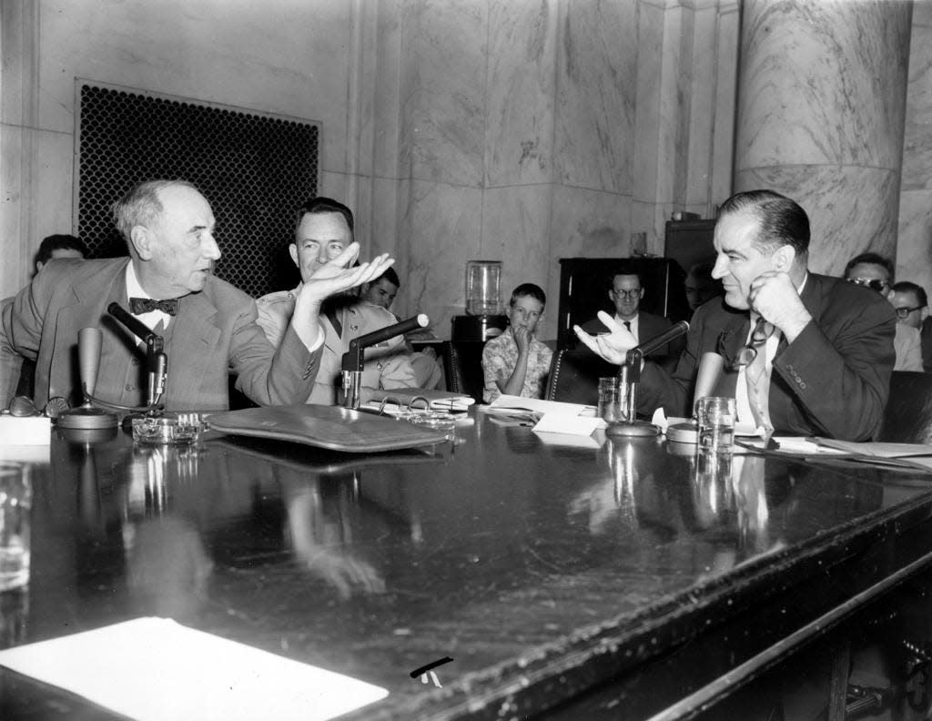 U.S. Army counsel Joseph Welch, left, and Sen. Joseph McCarthy gesture as they talk during the hearings of the Senate Investigations Subcommittee in the Army-McCarthy dispute in Washington, D.C, on June 1, 1954.