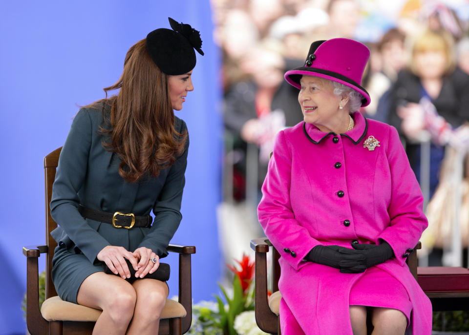 Catherine Duchess of Cambridge and Queen Elizabeth II listen to a speech as they, accompanied by Prince Philip, Duke of Edinburgh, visit Leicester on the first date of Queen Elizabeth II's Diamond Jubilee tour of the UK on March 8, 2012 in Leicester, England.