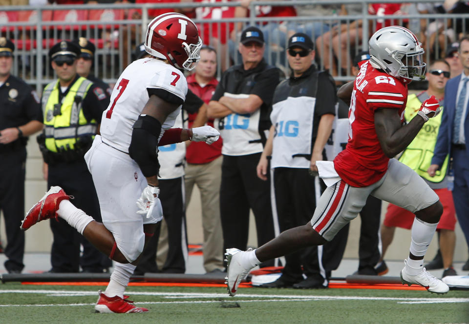 Ohio State receiver Parris Campbell, right, runs past Indiana linebacker Reakwon Jones on his way to scoring a touchdown during the first half of an NCAA college football game Saturday, Oct. 6, 2018, in Columbus, Ohio. (AP Photo/Jay LaPrete)