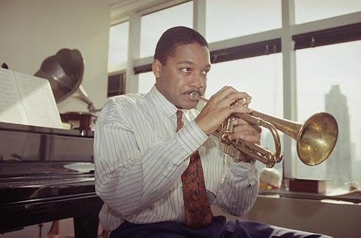 Jazz musician Wynton Marsalis hits a note on his trumpet during the taping of &#x201c;In Performance at the White House&#x201d; at the White House June 18, 1993. President Bill Clinton and Mrs. Clinton hosted the event, which marks the 40th anniversary of the Newport Jazz Festival.