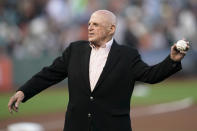 Former San Francisco Giants owner Bob Lurie throws out the ceremonial first pitch before a baseball game between the Giants and the Atlanta Braves in San Francisco, Saturday, Sept. 18, 2021. (AP Photo/Jeff Chiu)