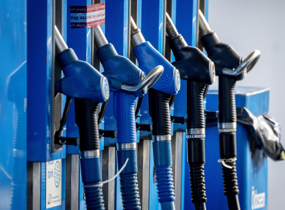 FILE - Gas pumps are shown at a gas station in Frankfurt, Germany, Wednesday, Oct. 5, 2022. Drivers in the U.S. and Europe are getting a break from the record-high pump prices they endured over the summer. But that price tag is still difficult for many customers who have been enduring relentless inflation and were used to lower prices. (AP Photo/Michael Probst, File)