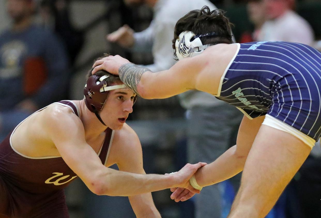 Woodridge's Steven Duffy, shown at the Bill Dies Memorial Wrestling Tournament earlier this year, won his fourth league championship Saturday.