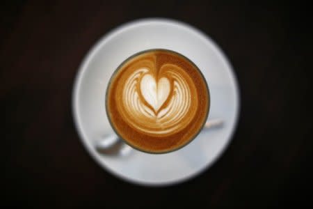 FILE PHOTO: A cup of latte coffee is pictured at a cafe in Sydney, Australia, May 12, 2014. REUTERS/Jason Reed/File Photo