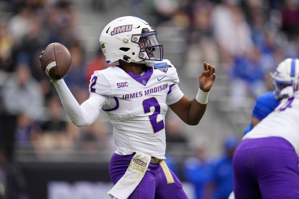 James Madison quarterback Jordan McCloud throws a pass against Air Force during the first half of the Armed Forces Bowl NCAA college football game, Saturday, Dec. 23, 2023, in Fort Worth, Texas. (AP Photo/Julio Cortez)