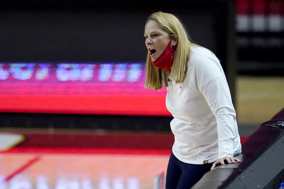 Maryland head coach Brenda Frese reacts during the second half of an NCAA college basketball game against Wisconsin, Thursday, Feb. 4, 2021, in College Park, Md. Frese tied a school record with her 499th win, reaching the milestone by guiding the 10th-ranked Terrapins past Wisconsin 84-48. Frese matched the mark set by Hall of Fame coach Chris Weller, who was at Maryland from 1975-2002. Weller was replaced by Frese, who's 499-130 over 19 seasons. (AP Photo/Julio Cortez)