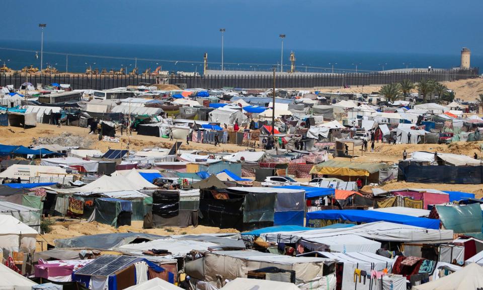 <span>Tents set up by displaced Palestinians in al-Mawasi near the border with Egypt in Rafah in the southern Gaza Strip.</span><span>Photograph: AFP/Getty Images</span>