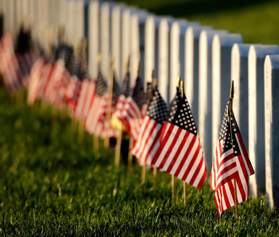 <p>Flags mark graves at Leavenworth National Cemetery on May 28, 2017, in Leavenworth, Kan. (Photo: Charlie Riedel/AP) </p>