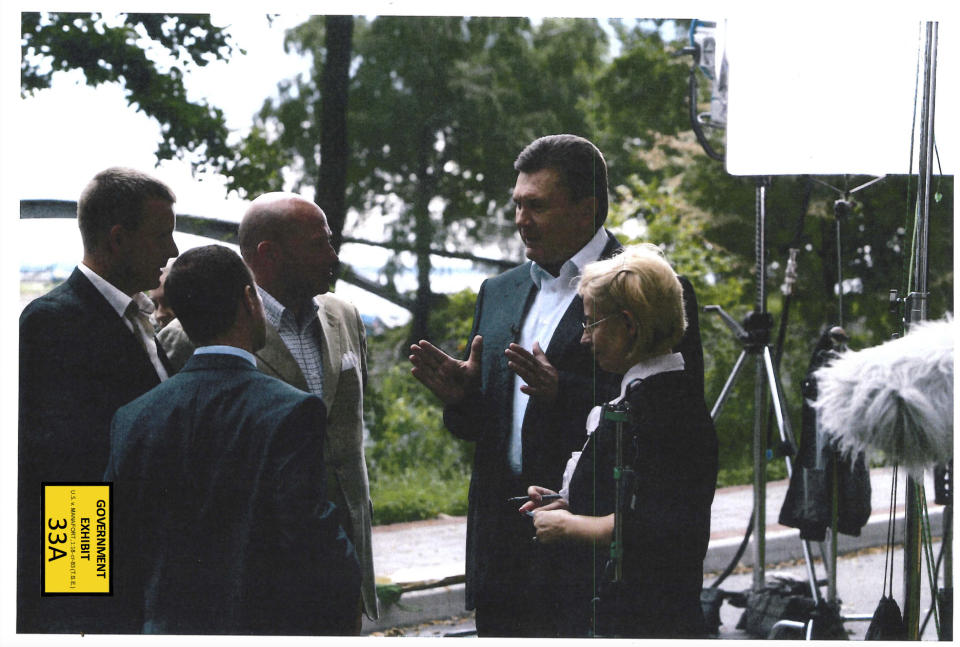 <p>This photo provided by the Department of Justice was introduced into evidence by the government on Wednesday, Aug. 1, 2018, during the second day of the fraud trial of former Trump campaign chairman Paul Manafort in federal court in Alexandria, Va., shows Victor Yanukovych, second from right. Manafort is accused of conspiracy to evade U.S. taxes and banking laws. It’s the first trial arising from special counsel Robert Mueller’s Russia probe.(Photo: Department of Justice via AP) </p>