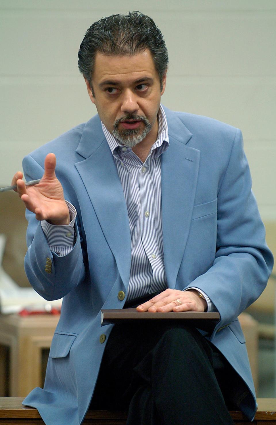 Andrei Malaev-Babel talks to his FSU/Asolo Conservatory student actors during a rehearsal for his 2011 production of “The Brothers Karamazov.”