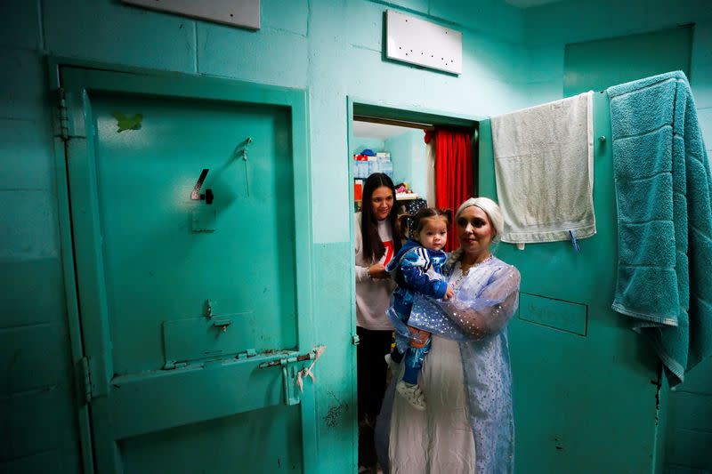 Argentine superheroes cheer up the children of prison inmates