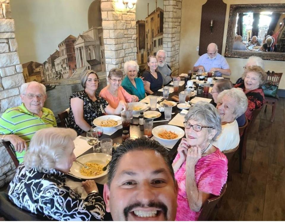 Senior Executive Director Israel Regus of the Solstice Senior Living community in Apple Valley takes a selfie.