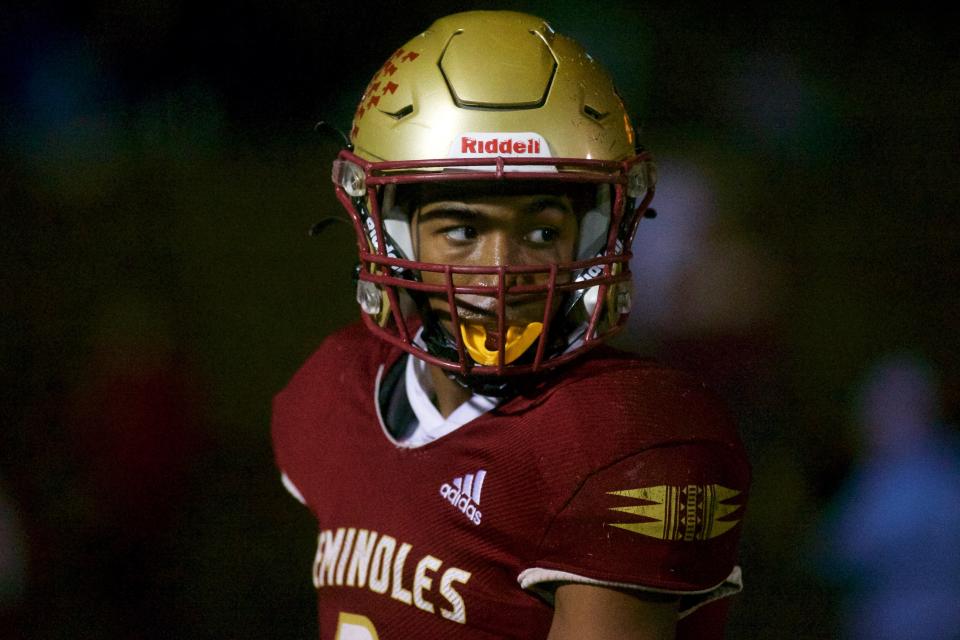 Florida High junior Micahi Danzy (8) celebrates a touchdown in the Class 2S state semifinal matchup between Florida High and Bishop Verot on Dec. 2, 2022, at Mike Hickman Stadium. The Seminoles won, 38-28.