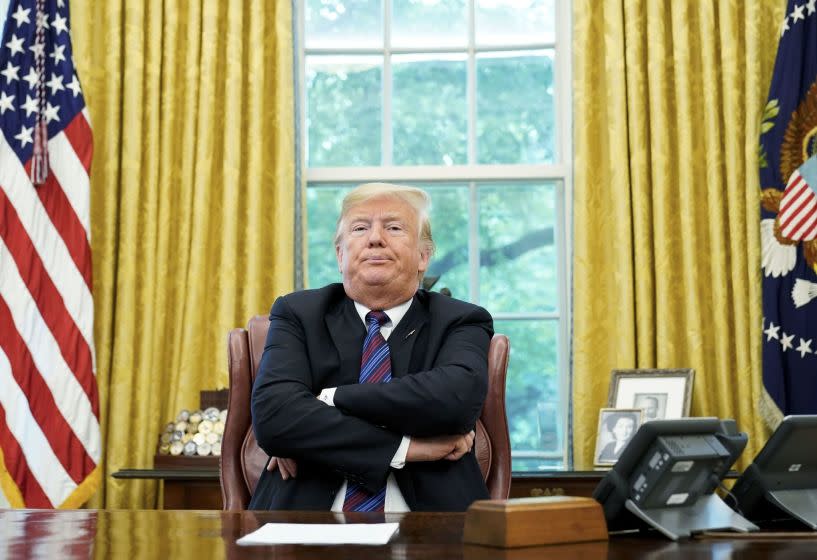 (FILES) In this file photo taken on August 27, 2018 US President Donald Trump speaks to reporters after a phone conversation with Mexico's President Enrique Pena Nieto on trade in the Oval Office of the White House in Washington, DC. - US President Donald Trump claimed August 28, 2018 that Google results were "rigged" because searches for "Trump News" brought up negative stories about him, and questioned whether this was illegal. The president has attacked US social media giants in the past days for allegedly censoring conservative voices, an unfounded claim widely believed by his followers."Google search results for 'Trump News' shows only the viewing/reporting of Fake New Media," the president tweeted on Tuesday. (Photo by MANDEL NGAN / AFP)MANDEL NGAN/AFP/Getty Images ** OUTS - ELSENT, FPG, CM - OUTS * NM, PH, VA if sourced by CT, LA or MoD **