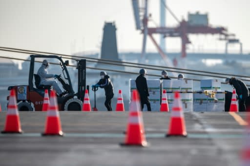 Supplies are transferred to the virus-stricken Diamond Princess cruise ship in Japan