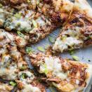 <p>This mouth-watering marriage of pulled pork and pizza will have your guests drooling. </p><p>Get the<strong> <a href="https://www.thepioneerwoman.com/food-cooking/recipes/a105522/bbq-pulled-pork-pizza/" rel="nofollow noopener" target="_blank" data-ylk="slk:BBQ Pulled Pork Pizza recipe;elm:context_link;itc:0;sec:content-canvas" class="link ">BBQ Pulled Pork Pizza recipe</a> </strong>from The Pioneer Woman.</p>