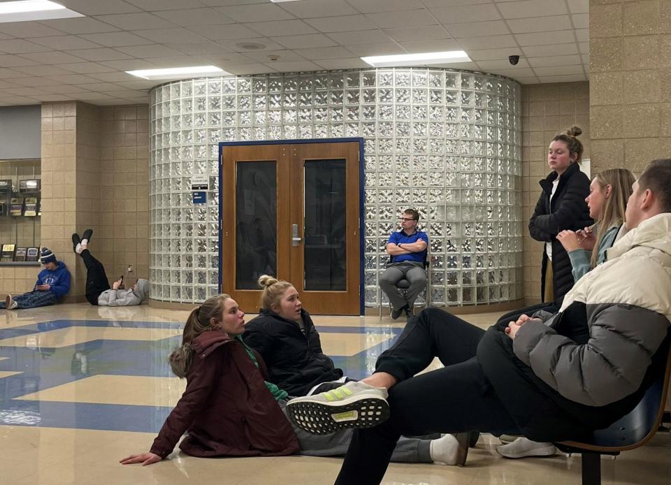 For hours on Wednesday night, Feb. 24, 2022, this was the public's view of the closed portion of the school board meeting as they deliberated in executive session. Black construction paper blocked out the view into the school library where the meeting was held.