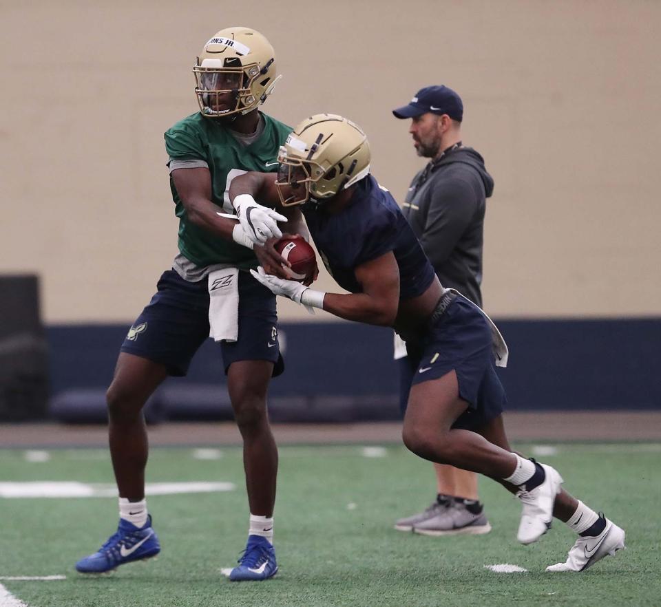 University of Akron football team showing uptempo vibe favored by new