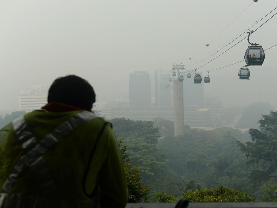 Cable cars traveling to and from Sentosa Island.