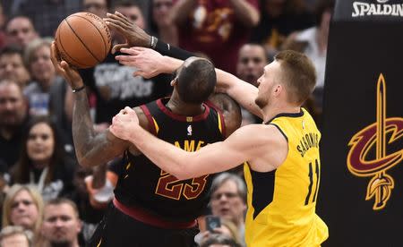 Apr 18, 2018; Cleveland, OH, USA; Indiana Pacers center Domantas Sabonis (11) commits a flagrant foul on Cleveland Cavaliers forward LeBron James (23) during the second half in game two of the first round of the 2018 NBA Playoffs at Quicken Loans Arena. Mandatory Credit: Ken Blaze-USA TODAY Sports