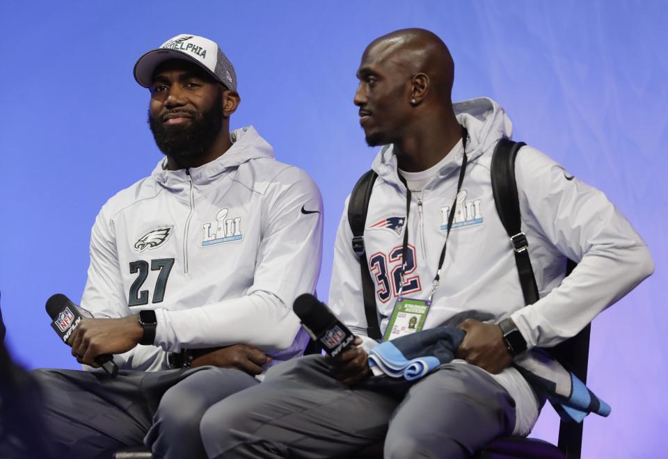 FILE - In this Jan. 29, 2018, file photo, Philadelphia Eagles' Malcolm Jenkins (27) and New England Patriots' Devin McCourty answer questions in St. Paul, Minn. Jenkins has teamed with fellow NFL players to launch a venture capital fund, Broad Street Ventures on Wednesday, Oct. 7, 2020. The fund focuses on late stage and growth stage technology and consumer products. Jenkins and co-founder Ralonda Johnson recruited additional NFL players and industry leaders to represent the fund. Among them are defensive backs Devin and Jason McCourty of the Patriots. (AP Photo/Eric Gay, File)