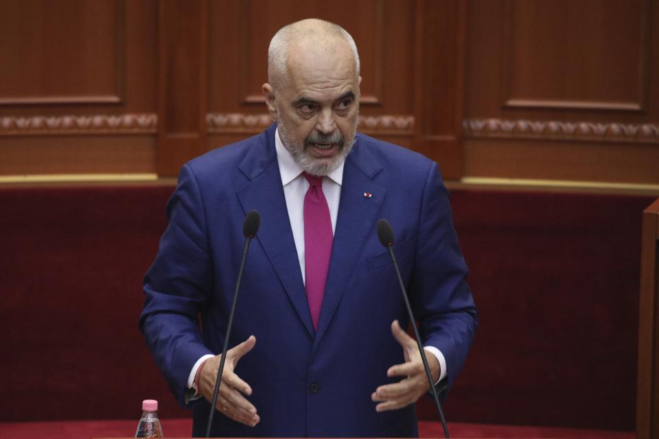 Albanian Prime Minister Edi Rama speaks during a debate at the parliament in Tirana, Albania, Thursday, Sept. 16, 2021. Albania's parliament was to vote late Thursday to approve the new, female-dominated Cabinet of Prime Minister Edi Rama, with 12 of the 17 jobs going to women, propelling Albania to the top of global rankings in terms of the percentage of women holding Cabinet positions. (AP Photo/Franc Zhurda)