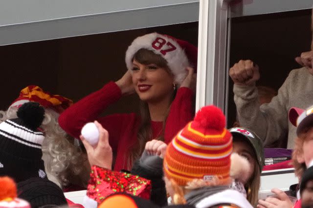 <p>Kirby Lee/Getty</p> Taylor Swift in a suite at Arrowhead Stadium at the Kansas City Chiefs game on Dec. 25, 2023