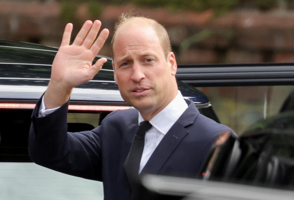 Britain's William, Prince of Wales waves at the crowd gathered outside Sandringham Estate, following the death of Britain's Queen Elizabeth, in eastern England, Britain, September 15, 2022. REUTERS/Marko Djurica