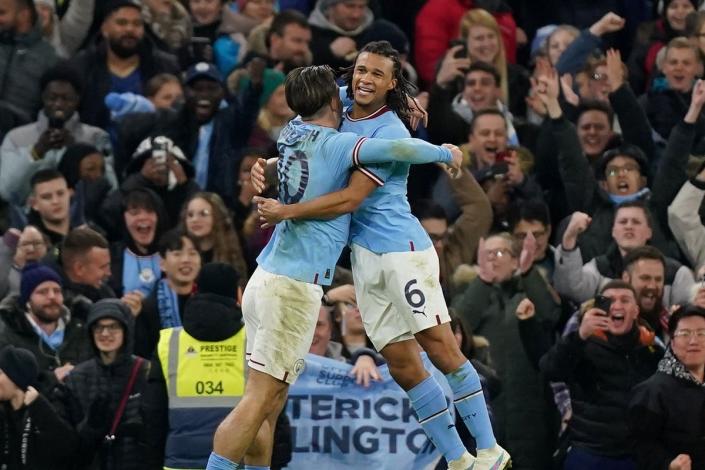 Manchester City’s Nathan Ake (right) and Jack Grealish celebrate (Mike Egerton/PA). (PA Wire)