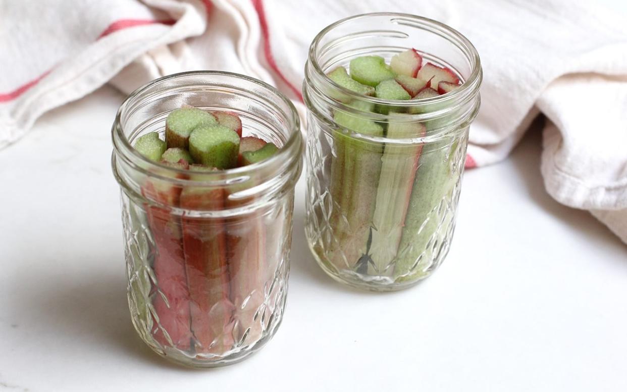 Rhubarb packed into mason jars