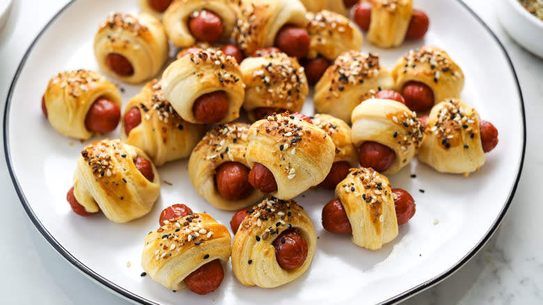 pigs in a blanket on a plate
