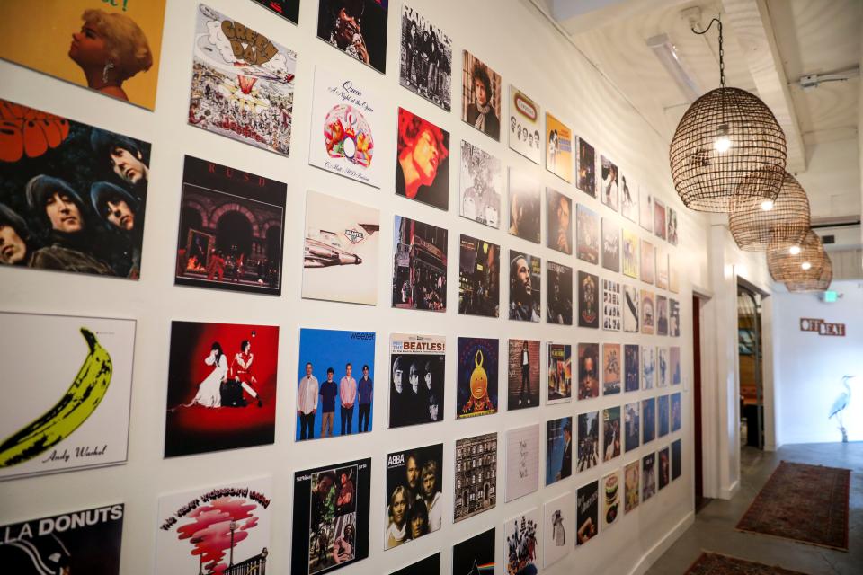 Popular album artwork decorates the hallway of Offbeat Coffee on Jan. 19 in Salem.