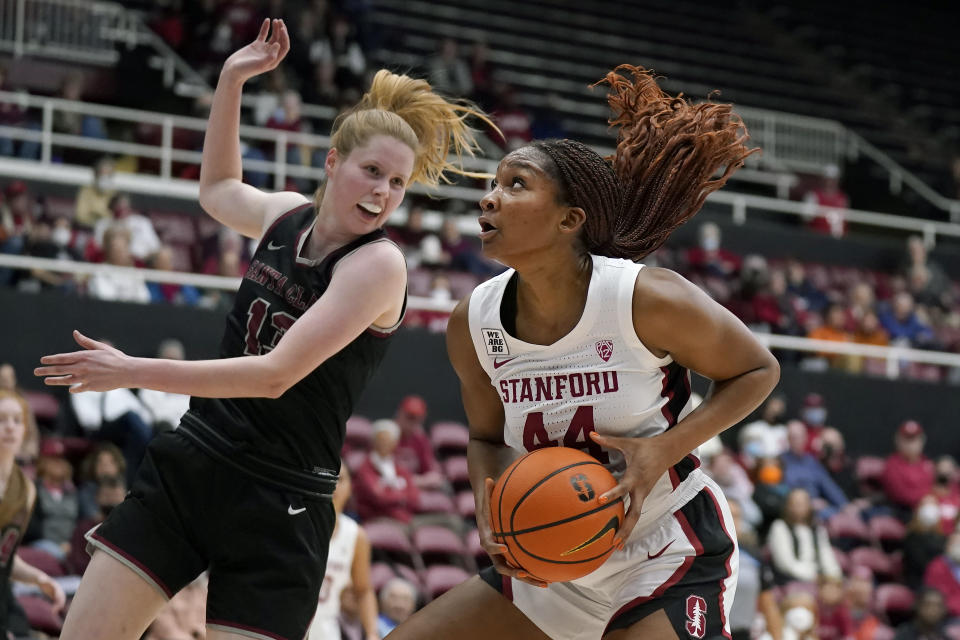 Stanford forward Kiki Iriafen (44) prepares to shoot against Santa Clara guard Lara Edmanson during the first half of an NCAA college basketball game in Stanford, Calif., Wednesday, Nov. 30, 2022. (AP Photo/Jeff Chiu)