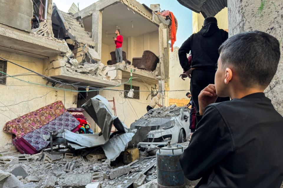 The site of an Israeli strike in Khan Younis, Gaza (Bassam Masoud/Reuters)