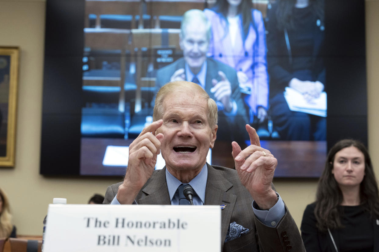 NASA Administrator Bill Nelson testifies, with a name card in front of him that says: The Honorable Bill Nelson.