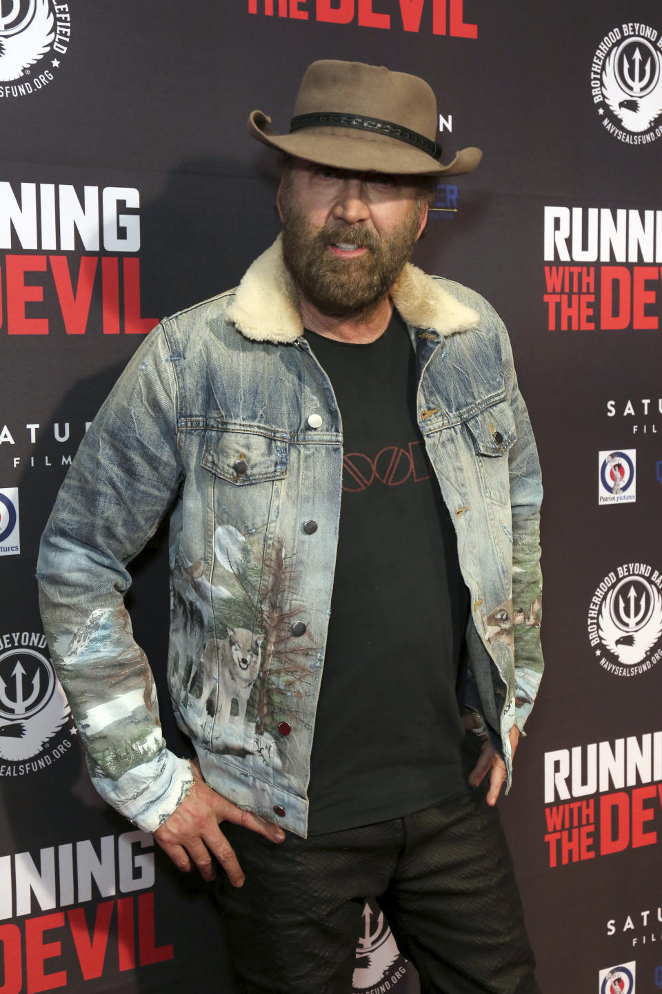 Nicolas Cage attends the LA Premiere of "Running with the Devil," at the Writers Guild Theater, Monday, Sept. 16, 2019, in Beverly Hills, Calif. (Photo by Willy Sanjuan/Invision/AP)