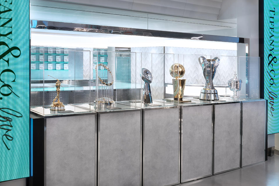 NFL, NBA, MLS and other league championship trophies on display at Tiffany & Co's new men's flagship store in New York City.