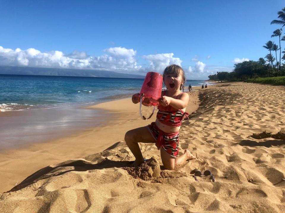 Ellie Collins, 5, plays in the sand on north Kaanapali Beach on Maui on a July vacation with her family. The Las Vegas family visited Hawaii for the first time this month, their first big vacation since the pandemic canceled a trip to Germany.