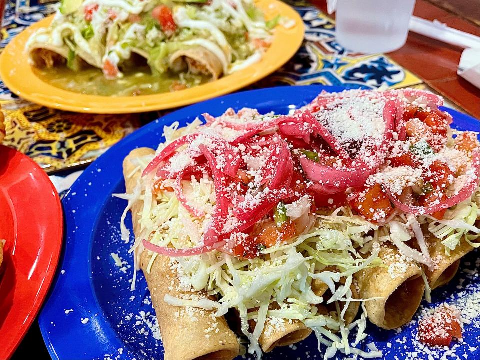 Tacos Hondurenos (front) and Enchiladas Mexicanas (back) from El Sabor Latino.