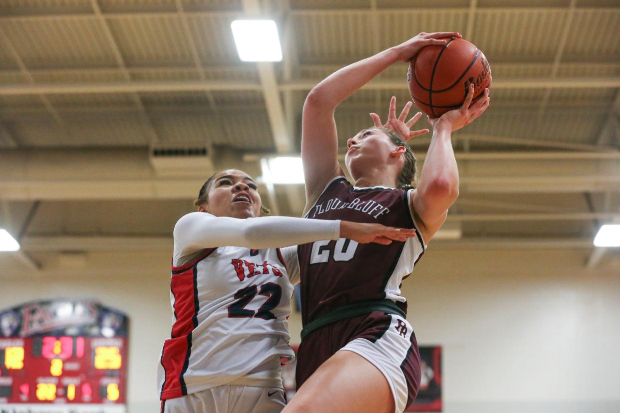Veterans Memorial's Nevaeh Gray attempts to block Flour Bluff's Maggie Croft during a game on Tuesday, Jan. 30, 2024, in Corpus Christi, Texas.