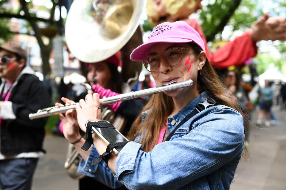 Caitie McMekin of Honkers and Bangers performing in the CattyWampus Puppet Parade at the Rossini Festival on Sunday, April 21, 2024 in Knoxville, Tenn.