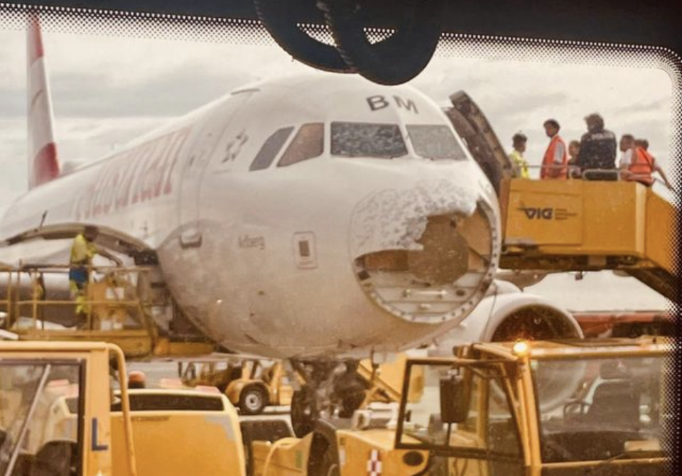 The nose of an Austrian Airlines flight was left shredded on June 9, 2024 after the flight encountered a sudden hail storm.  / Credit: Anonymous via Storyful