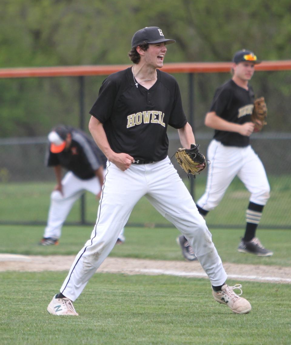 Howell pitcher David Zilch celebrates after an inning-ending strikeout during a 12-2 victory over Brighton on Monday, May 8, 2023.