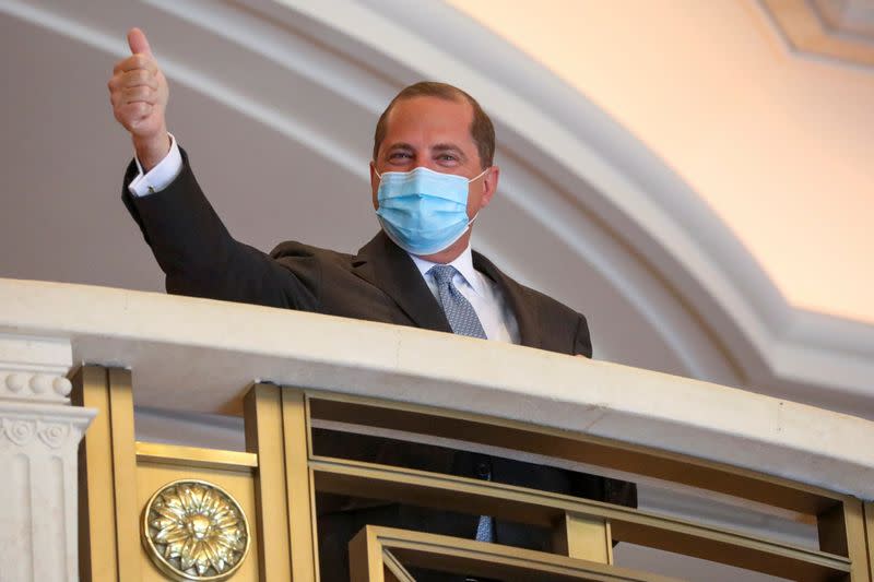 U.S. Secretary of Health and Human Services Alex Azar gestures to the media in Taipei