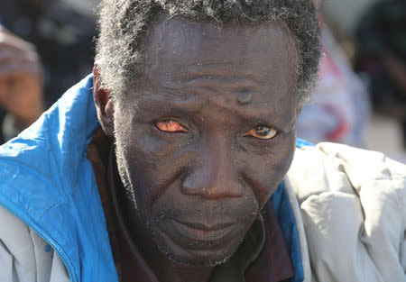 A migrant is seen at a naval base after being rescued by the Libyan coast guard in Tripoli, Libya March 10, 2018. REUTERS/Hani Amara