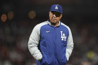 Los Angeles Dodgers manager Dave Roberts walks to the dugout after making a pitching change during the seventh inning of the team's baseball game against the San Francisco Giants in San Francisco, Tuesday, July 27, 2021. (AP Photo/Jeff Chiu)