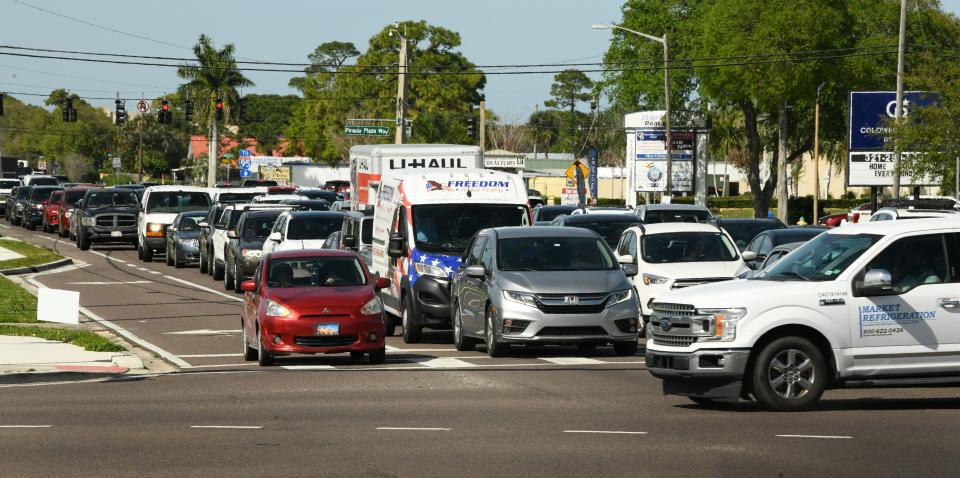 Southbound Wickham Road at the Pineda Causeway intersection west of Palm Shores.