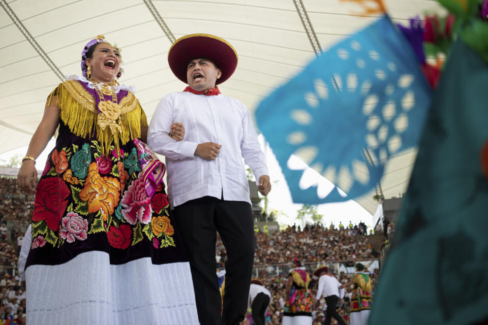 Dancers perform on the first day of the Guelaguetza festival in Oaxaca, Mexico, Monday, July 17, 2023. During the government-sponsored event, 16 Indigenous ethnic groups and the Afro-Mexican community promote their traditions through public dances, parades and craft sales. (AP Photo/Maria Alferez)